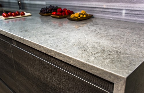 What are the pros and cons of solid surface countertops